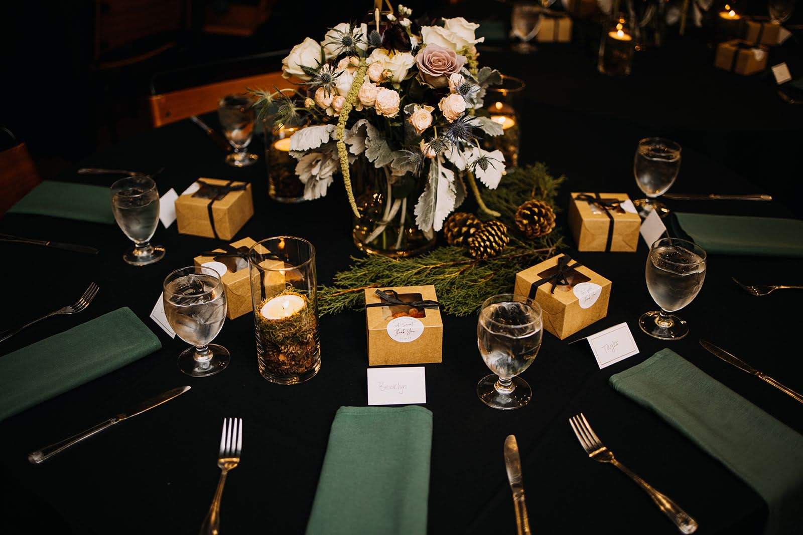 Round table with formal place settings and glasses